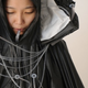 Illustration for article titled When Eco-Friendly Clothing Goes Sci-Fi Noir, You End Up With the RainCatch